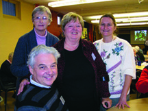 Sisters Frances Brady and Christine Gebel (left and right) with Bonnie and Dave Collacutt at the Awakening the Dreamer symposium. Toronto.