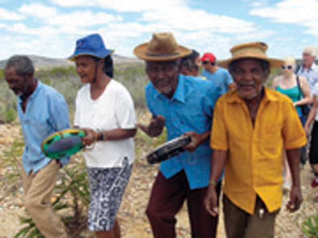 Albertina, her brother Aubino (centre), and João lead our procession to the shrine to Our Lady on the hilltop overlooking the majestic San Francisco River. A planned hydro dam mega project will submerge the lands where they have lived for 300 years.