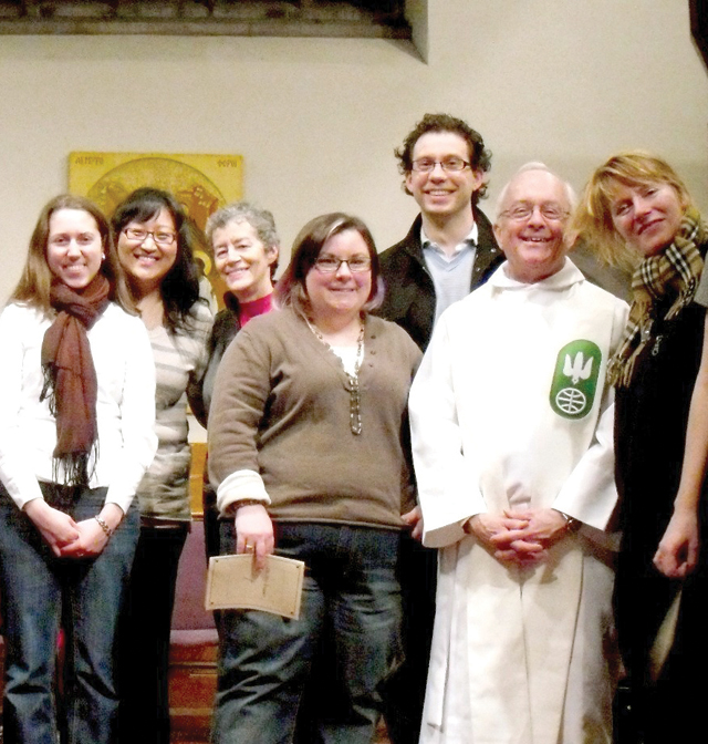 Fr. Mike Traher and participants at the closing mass of a retreat at the Newman Centre, University of Toronto.