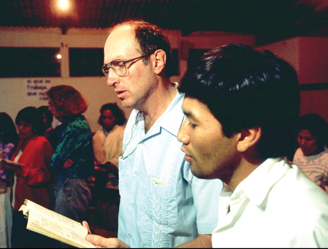 Fr. Frank Hegel at a small faith gathering where the people prayed, reflected and organized to better their lives.