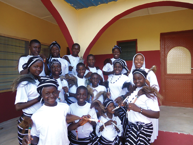 Sr. Eucharia Ugwu, principal of the St. Francis School for the Deaf and Blind with the students who danced during the blessing and opening of their new classroom block. October 2012, Vandeikya, Nigeria.,