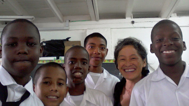Donna Joy Tai with some of her Bosco boys from the St. John Bosco Orphanage and Bosco Academy where she teaches Spanish and assists with after school reading.