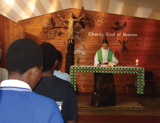 Fr. Jim McGuire celebrates the Eucharist at Marymount Catholic Secondary School, an all girls boarding school. Malawi.