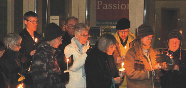 Our Lady’s Missionaries and participants of the Eucharistic Celebration of Social Justice last November at Regis College, Toronto School of Theology, take part in a candlelight vigil to recognize the city’s homeless. They gathered in front of the college at the statue of the Homeless Jesus, the work of sculptor Timothy Schmalz.