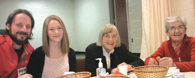 L-R: Brenton Bentz, Margaret Sciberas, and Sisters Susan Moran and Clarice Garvey. St. Brigid’s parish Out of the Cold program. Toronto.