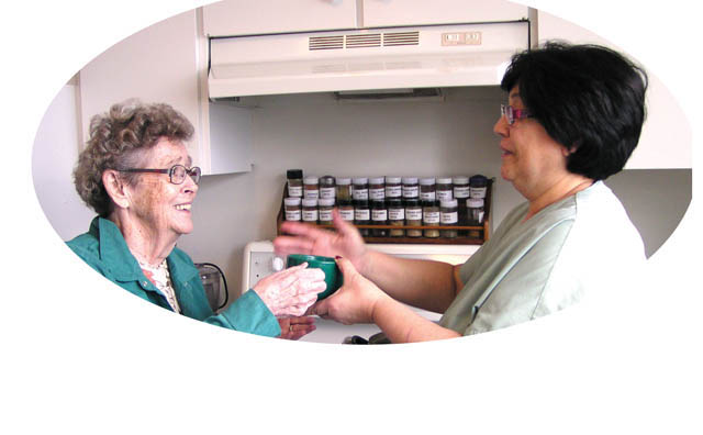 Sister Rosemarie Donovan (left) and Natalia Tavares, staff person and friend, at the OLM house in Toronto.